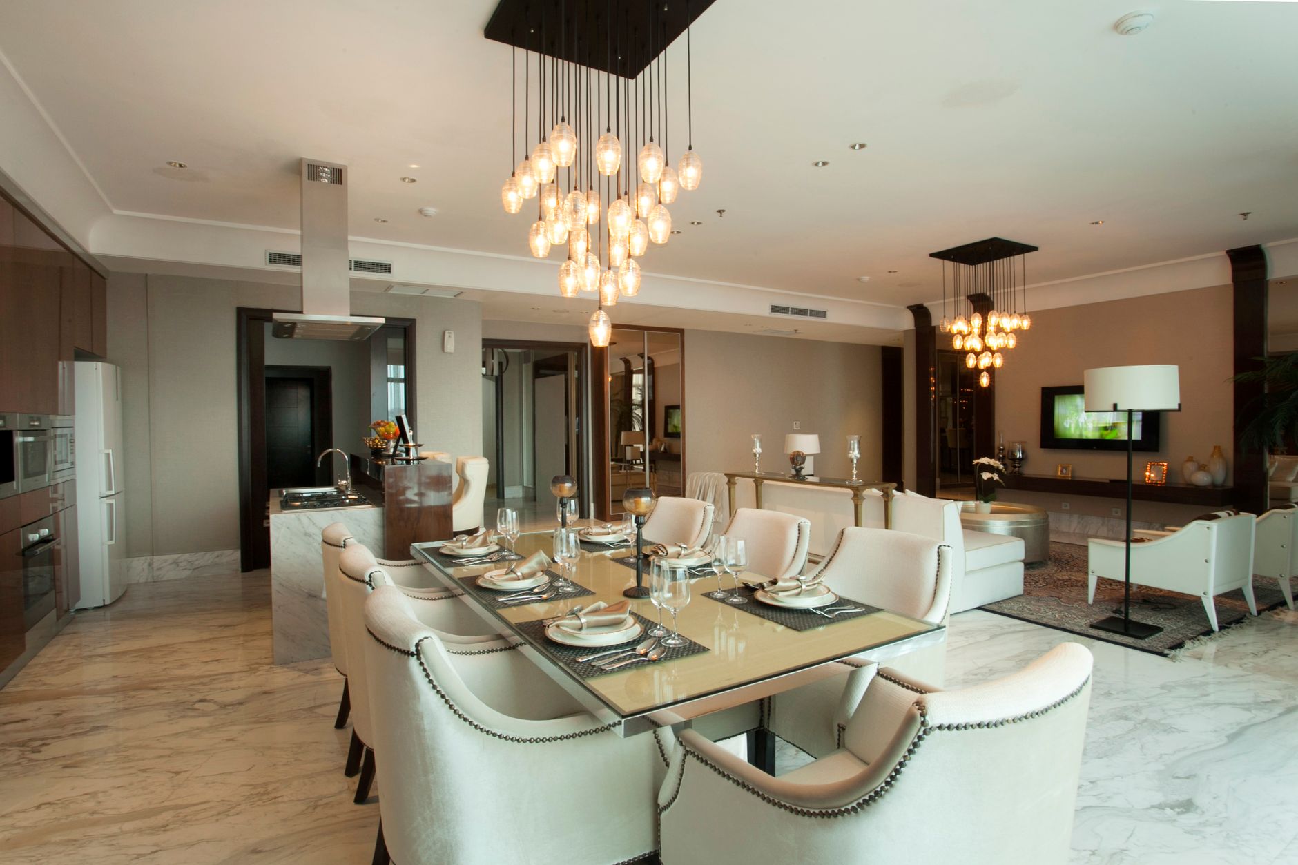 clear glass table with chairs